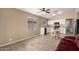 Well-lit kitchen area featuring white cabinetry, tile flooring and a breakfast nook at 16737 N 157Th Ave, Surprise, AZ 85374
