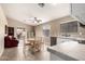 Kitchen area showcasing tile flooring, backyard view and a breakfast nook at 16737 N 157Th Ave, Surprise, AZ 85374