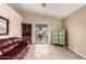 Open living area with tile flooring, sliding glass doors and a view to the backyard at 16737 N 157Th Ave, Surprise, AZ 85374
