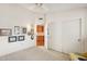 Bedroom featuring a closet and a hallway space with wood cabinets at 19835 N Alta Loma Dr, Sun City West, AZ 85375
