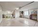 This large garage features built-in storage, with room for laundry, extra workspace, and seasonal items at 19835 N Alta Loma Dr, Sun City West, AZ 85375