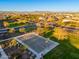 Aerial view of a community basketball court surrounded by trees and green space at 20088 E Maya Rd, Queen Creek, AZ 85142