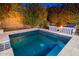 Relaxing hot tub area with comfortable seating and a view of the well-manicured backyard at 20088 E Maya Rd, Queen Creek, AZ 85142