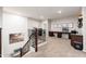 Open loft area featuring a built-in desk, staircase, and ample natural light at 20088 E Maya Rd, Queen Creek, AZ 85142