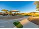 A well-maintained community playground with shade structures and picnic tables at 20088 E Maya Rd, Queen Creek, AZ 85142