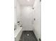 Modern shower with marble tile, glass enclosure, and sleek fixtures at 20088 E Maya Rd, Queen Creek, AZ 85142