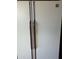A white refrigerator with vertical handles adds charm to this functional appliance at 205 S Higley Rd # 8, Mesa, AZ 85206