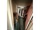Walk in closet with a rod and shelf, and carpeted floor at 2102 N Garrett Dr, Chandler, AZ 85225