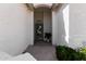 Inviting front entrance with a decorative door and lush greenery at 24812 S Pleasant Ct, Sun Lakes, AZ 85248
