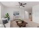 Comfortable living room showcasing neutral decor, stylish furniture, and a serene ambiance at 24812 S Pleasant Ct, Sun Lakes, AZ 85248