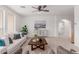 Cozy living room with neutral colors, stylish decor, and plenty of space for relaxing or entertaining at 24812 S Pleasant Ct, Sun Lakes, AZ 85248
