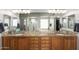 Bathroom featuring double sinks and granite countertops at 26991 N 97Th Ln, Peoria, AZ 85383