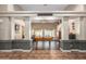 Entertain in a spacious game room with billiard table, tile floors, and decorative columns at 26991 N 97Th Ln, Peoria, AZ 85383