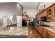 Spacious kitchen with stainless steel appliances and hardwood floors, showcasing ample counter space at 26991 N 97Th Ln, Peoria, AZ 85383