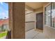 View of secure front door and charming welcome mat on balcony with wrought iron railing at 2929 W Yorkshire Dr # 2013, Phoenix, AZ 85027