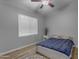 Comfortable bedroom with a ceiling fan and natural light at 2929 W Yorkshire Dr # 2013, Phoenix, AZ 85027