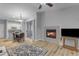 Open-concept living space with fireplace, and dining area at 2929 W Yorkshire Dr # 2013, Phoenix, AZ 85027