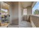 Private outdoor patio with a view through sliding glass doors, a perfect extension of indoor living at 2929 W Yorkshire Dr # 2013, Phoenix, AZ 85027