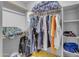 Organized walk-in closet with clothing racks and storage shelves, providing efficient storage solutions at 2929 W Yorkshire Dr # 2013, Phoenix, AZ 85027