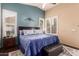 Serene main bedroom featuring plantation shutters, a ceiling fan, and a comfortable king-size bed at 30411 N 42Nd Pl, Cave Creek, AZ 85331