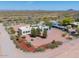 Desert property featuring a contemporary home, set on a large lot, and close to desert landscape and a clear blue sky at 30917 N 163Rd Dr, Surprise, AZ 85387