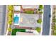 Aerial view of a home showing the pool, spa, and spacious backyard with well-maintained landscaping at 3220 N 136Th Dr, Avondale, AZ 85392