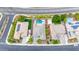 Overhead shot of a home with a pool and landscaped backyard, nestled in a residential neighborhood at 3220 N 136Th Dr, Avondale, AZ 85392