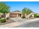 Inviting single-Gathering home with a two-car garage, desert landscaping, and a neatly maintained front yard and walkway at 3220 N 136Th Dr, Avondale, AZ 85392