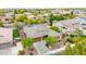 An aerial front view of a single-Gathering home with a well-maintained lawn and landscaping at 3220 N 136Th Dr, Avondale, AZ 85392