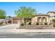 Charming single-story home with a well-manicured front yard and beautiful desert landscaping in a desirable neighborhood at 3220 N 136Th Dr, Avondale, AZ 85392