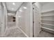 Long hallway with recessed lighting and carpeted floors, leading to rooms and closets for convenient access at 3220 N 136Th Dr, Avondale, AZ 85392