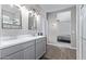 Bright bathroom featuring double sinks, tiled floor and separated shower room at 36708 N Petra Dr, San Tan Valley, AZ 85143