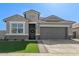 Charming single-Gathering home featuring a well-manicured front yard and 2-car garage at 36708 N Petra Dr, San Tan Valley, AZ 85143
