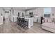 Spacious kitchen showcasing ample counter space, modern appliances, and a breakfast bar at 36708 N Petra Dr, San Tan Valley, AZ 85143