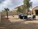 Backyard with barbecue area, outdoor seating, and drought resistant landscaping at 36765 W Mediterranean Way, Maricopa, AZ 85138
