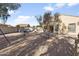Backyard featuring neutral tones and a lounge area perfect for entertaining or relaxing at 36765 W Mediterranean Way, Maricopa, AZ 85138