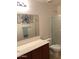 Clean bathroom with modern fixtures, updated shower, and a stylish mirror at 36765 W Mediterranean Way, Maricopa, AZ 85138