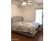 Cozy bedroom with plush, patterned bedding and plenty of natural light at 36765 W Mediterranean Way, Maricopa, AZ 85138