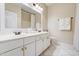 Bathroom featuring a large vanity with dual sinks, updated fixtures, and a separate shower at 3682 S Rosemary Dr, Chandler, AZ 85248
