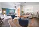 Bright living room boasts stylish furnishings, a modern rug, and ample natural light at 3682 S Rosemary Dr, Chandler, AZ 85248