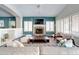 Beautiful living room showcases a cozy fireplace, neutral tones, and comfortable furniture at 3682 S Rosemary Dr, Chandler, AZ 85248