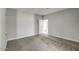 Neutral bedroom with plush carpet and doorways to the bathroom at 38538 W San Juan Ave, Tonopah, AZ 85354