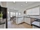Open kitchen featuring granite countertops, stainless steel appliances, and a dining area at 3925 W Hackamore Dr, Phoenix, AZ 85083