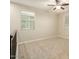 Carpeted bedroom with neutral walls, a ceiling fan, recessed lights, and two windows at 4084 E Rawhide St, Gilbert, AZ 85296