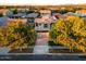 Two-story home with desert landscaping and a brick-paved driveway in a residential area at 4084 E Rawhide St, Gilbert, AZ 85296