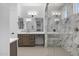 Stylish bathroom showcasing marble shower, large mirror, and vanity with ample storage at 4211 E Desert Vista Trl, Cave Creek, AZ 85331