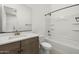 Bright bathroom featuring a single vanity, a toilet, and a shower-tub combo at 4211 E Desert Vista Trl, Cave Creek, AZ 85331