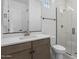 Modern bathroom with white honeycomb tile shower, quartz countertop, and bronze fixtures at 4211 E Desert Vista Trl, Cave Creek, AZ 85331