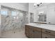 This bathroom features a vanity with marble accents and a glass walk-in shower at 4211 E Desert Vista Trl, Cave Creek, AZ 85331