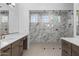 Bright bathroom featuring a glass shower with marble tile and a double vanity at 4211 E Desert Vista Trl, Cave Creek, AZ 85331